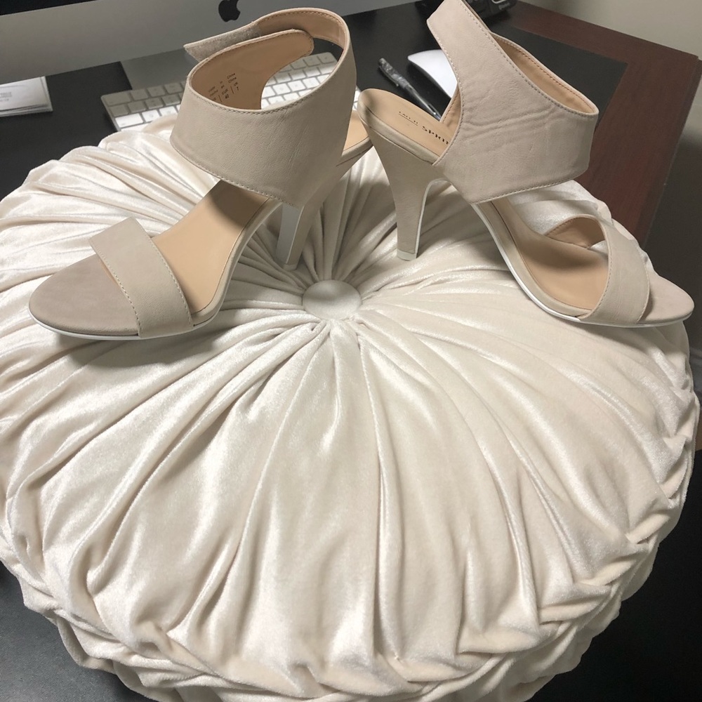 Used Call it Spring Nude Strap heels.
